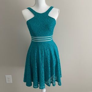 Teal floral print dress.